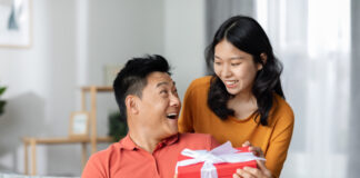People exchanging a gift